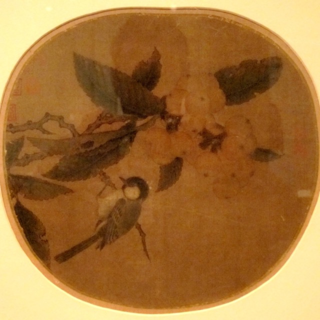 Song dynasty painting of a bird on a loquat branch